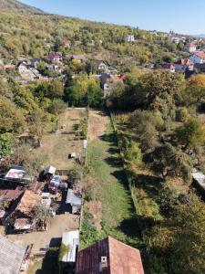 VILĂ P+1 SEMIFINISATĂ | 180 MP UTILI | TEREN 1.233 MP | VALE LA LIMITA PROPRIETĂȚII
