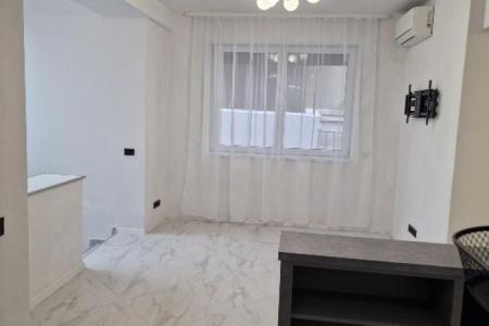Piata Romana, de inchiriat -5 camere, apartament nou in vila, parter, sect 1