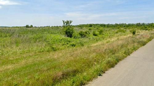 Teren intravilan 16 ha, vecinatate DR4, acces dublu la asfalt